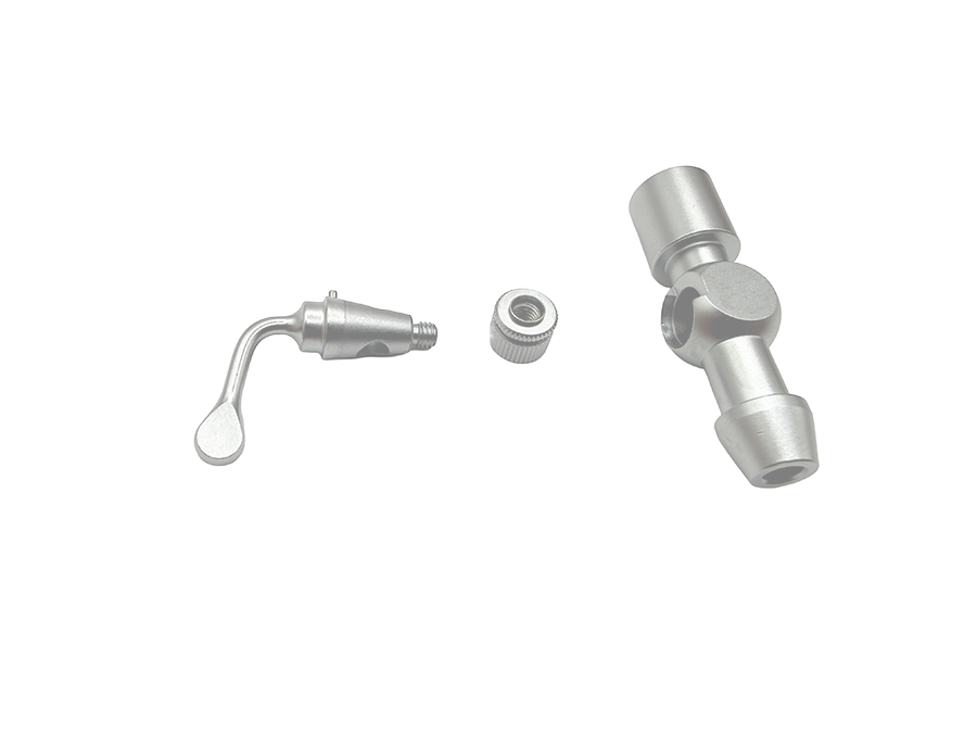 MV-LLMSC ST-style stopcock dismantled, showing the separated body, valve plug with lever, and retaining nut